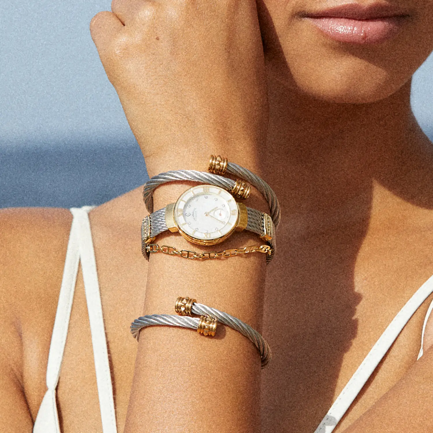 ST TROPEZ®, 25MM, QUARTZ CALIBRE, MOTHER-OF-PEARL WITH 11 DIAMONDS DIAL, YELLOW GOLD PVD BEZEL, STEEL CABLE BRACELET & YELLOW GOLD PVD DECORS - Image 7